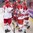 BUFFALO, NEW YORK - JANUARY 2: Denmark's Jeppe Mogensen #7, David Madsen #23 and Andreas Grundtvig #22 celebrate a goal by teammate Phillip Schultz #27 against Belarus during the relegation round of the 2018 IIHF World Junior Championship. (Photo by Andrea Cardin/HHOF-IIHF Images)

